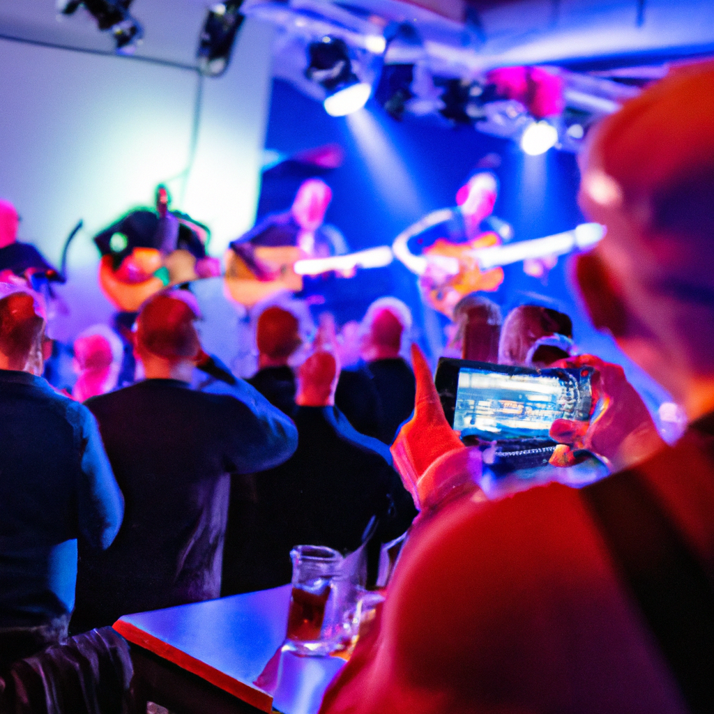 Live-Musikaufführung mit performenden Musikern und Publikum in einem beleuchteten Raum.